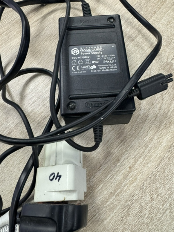 картинка Блок питания для GameCube 220 вольт DOL-002 (UKV) оригинал. Купить Блок питания для GameCube 220 вольт DOL-002 (UKV) оригинал в магазине 66game.ru