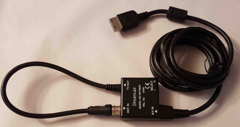 картинка RF модулятор Original SEGA Dreamcast HTK-8830 PAL USED. Купить RF модулятор Original SEGA Dreamcast HTK-8830 PAL USED в магазине 66game.ru