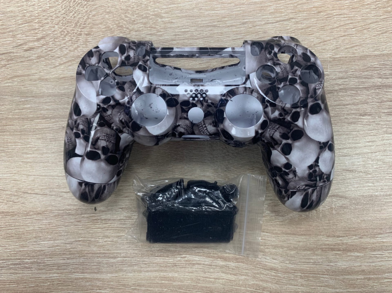 картинка Корпус для Dualshock 4 v1 с рисунком черепа (JDM -001/011) от магазина 66game.ru