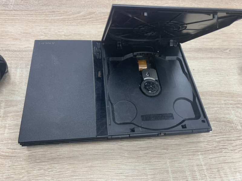 картинка неисправная приставка PS2 от магазина 66game.ru