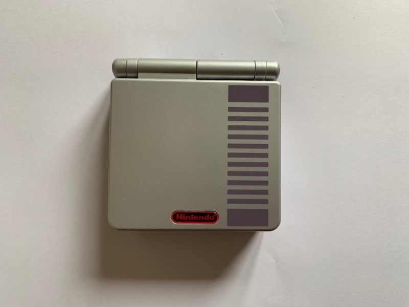 Game Boy Advance SP AGS - 001 NES Edition [NEW]. Купить Game Boy Advance SP AGS - 001 NES Edition [NEW] в магазине 66game.ru