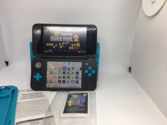 New Nintendo 2DS XL (черная + синяя) Luma + Игры (USED) 2