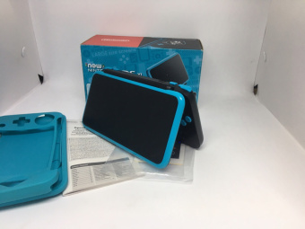 New Nintendo 2DS XL (черная + синяя) Luma + Игры (USED) 3