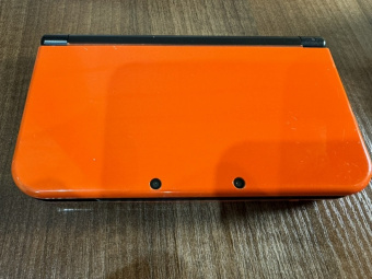 New Nintendo 3DS XL (оранжевая) + 32 Gb (Игры) USED 1